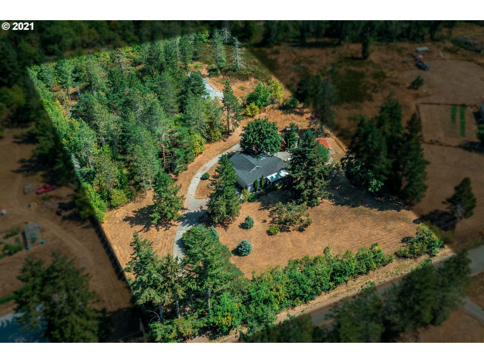 7400 Ash Street Grand Ronde, OR 97347 - Photo 4 of 23 a view of a yard