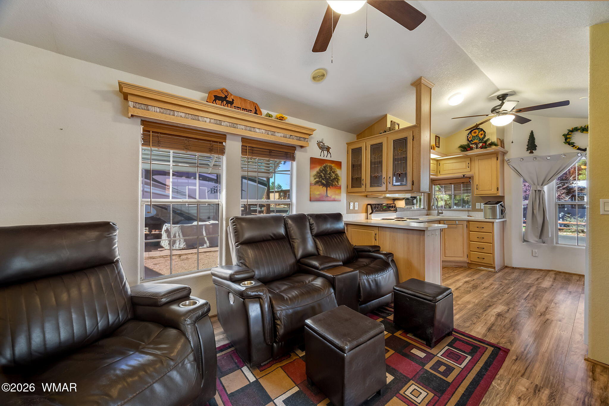 2725 Whiskey Road Overgaard, AZ 85933 - Photo 11 of 32 a living room with furniture and a large window