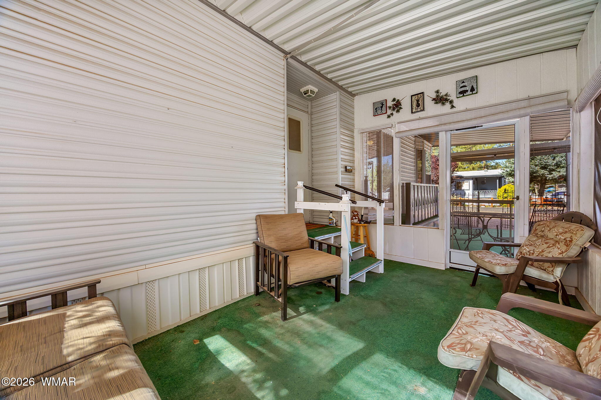 2725 Whiskey Road Overgaard, AZ 85933 - Photo 19 of 32 a view of a chair and table in backyard of the house
