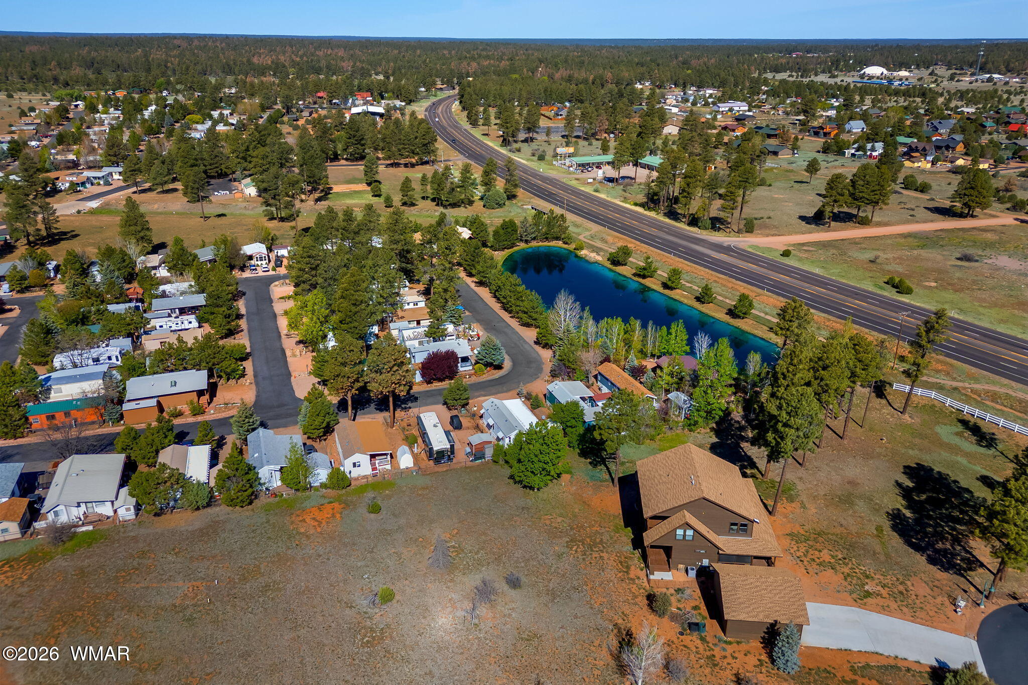 2725 Whiskey Road Overgaard, AZ 85933 - Photo 27 of 32 an outdoor view of the ocean and trees