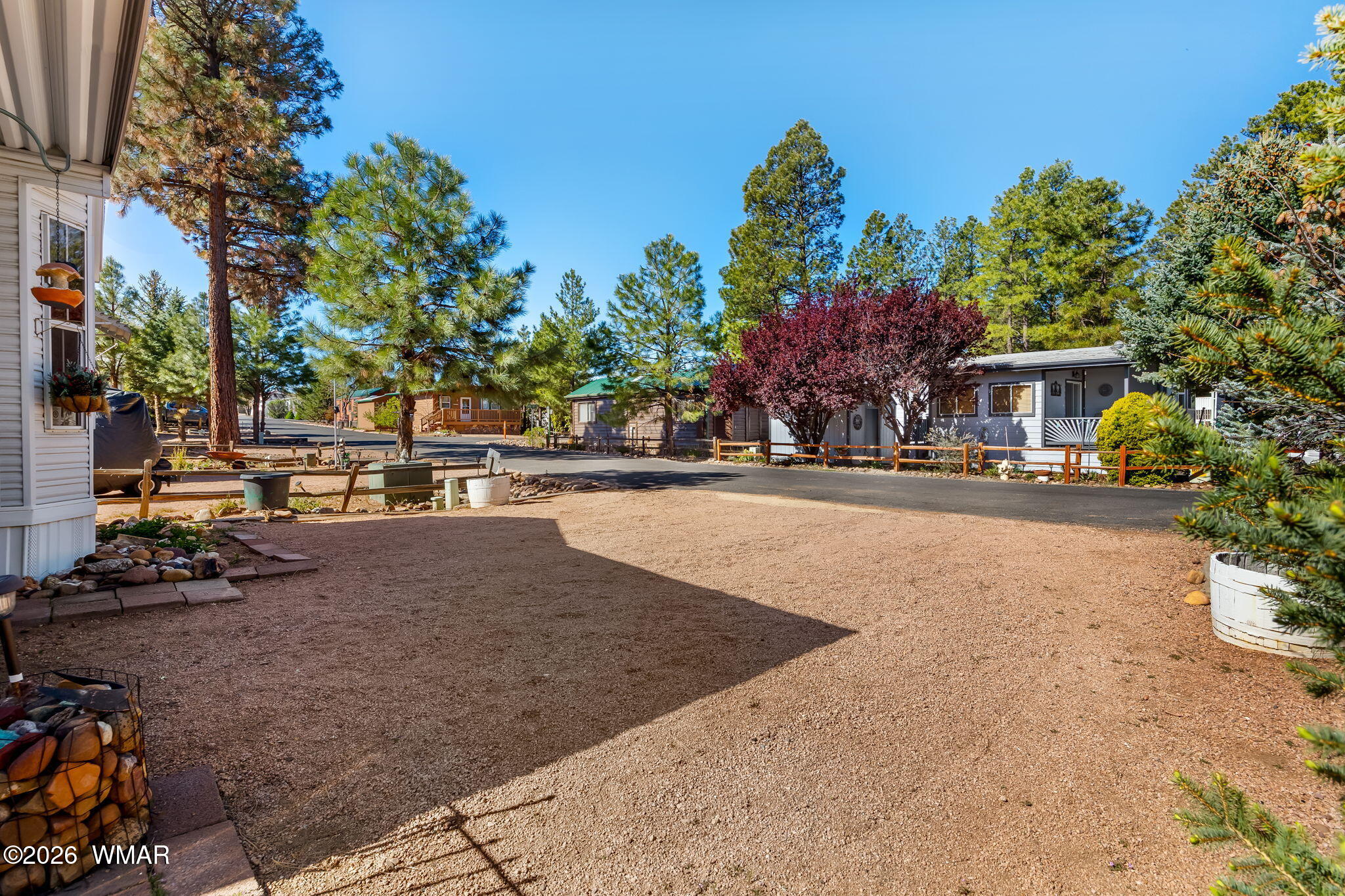 2725 Whiskey Road Overgaard, AZ 85933 - Photo 6 of 32 a view of a street with houses