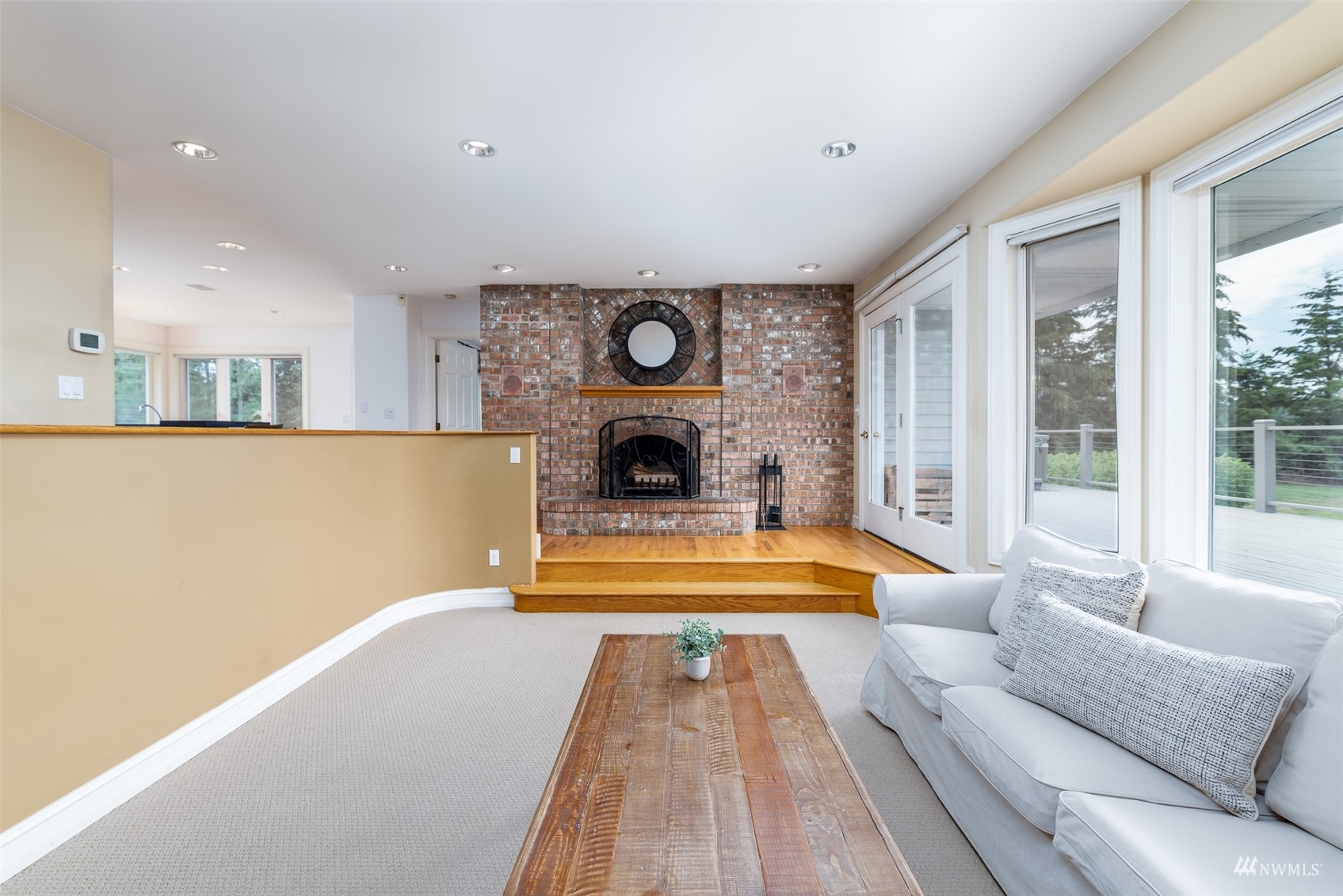 9647 Axlund Road Lynden, WA 98264 - Photo 11 of 39 a living room with furniture and a fireplace