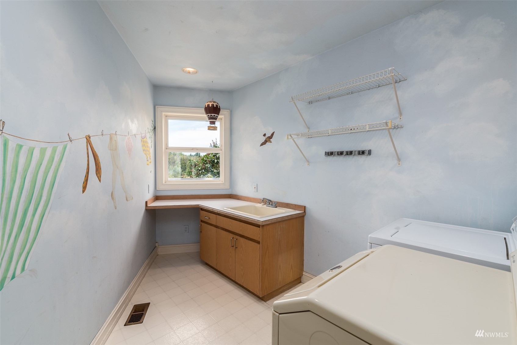 9647 Axlund Road Lynden, WA 98264 - Photo 20 of 39 a room with storage and utility