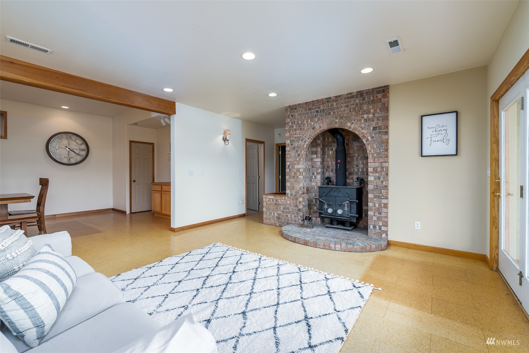9647 Axlund Road Lynden, WA 98264 - Photo 25 of 39 a living room with couch and a fireplace