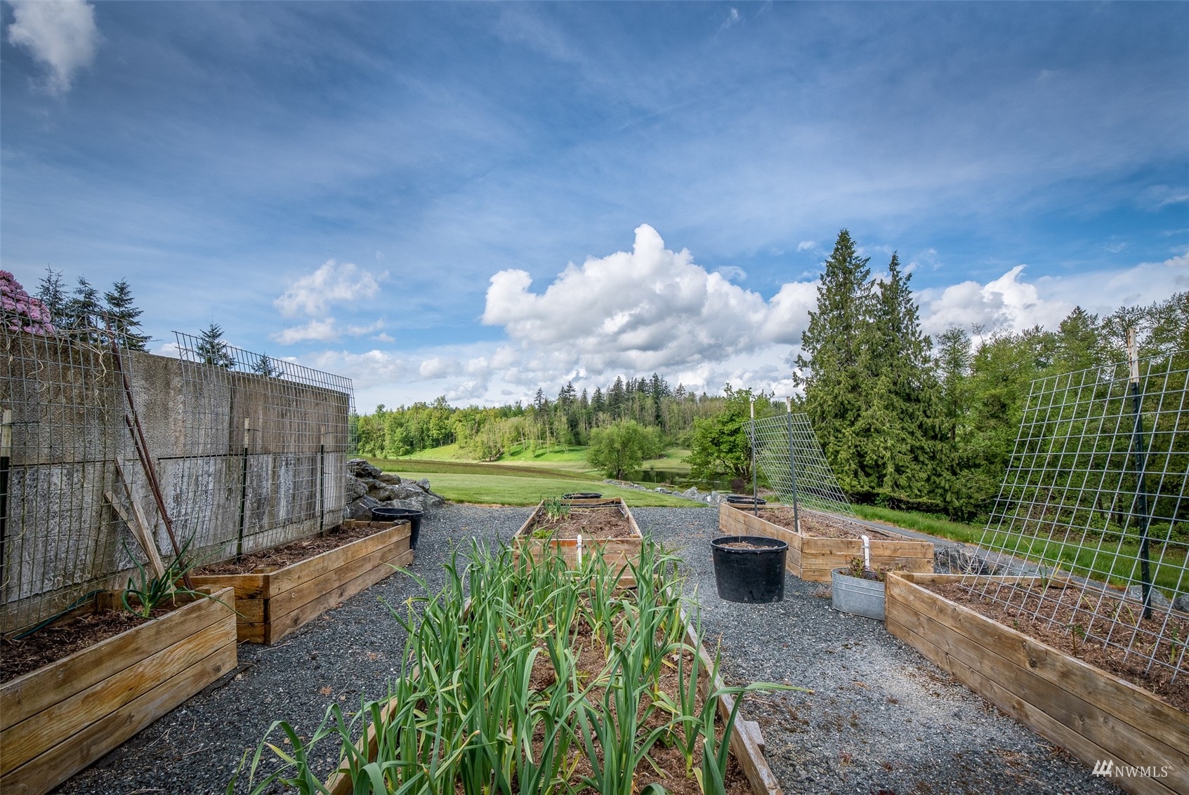 9647 Axlund Road Lynden, WA 98264 - Photo 34 of 39 a view of a backyard with sitting area