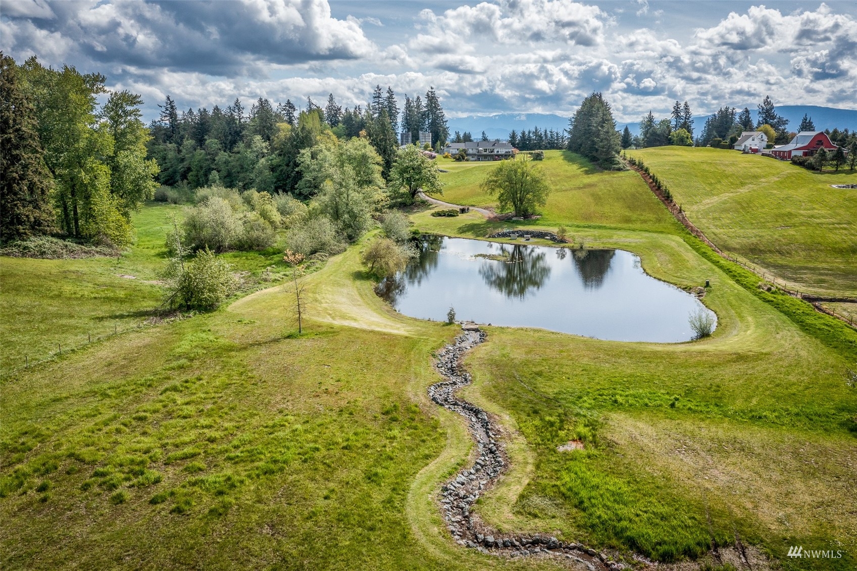 9647 Axlund Road Lynden, WA 98264 - Photo 39 of 39 a view of a swimming pool with a yard