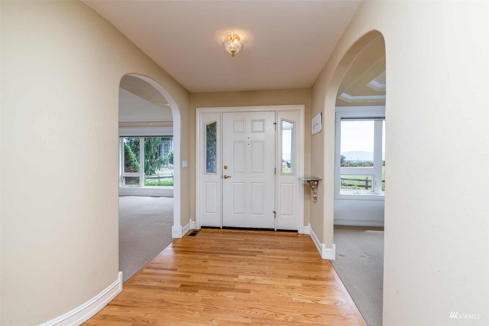 9647 Axlund Road Lynden, WA 98264 - Photo 6 of 39 a view of a room with wooden floor and a sink