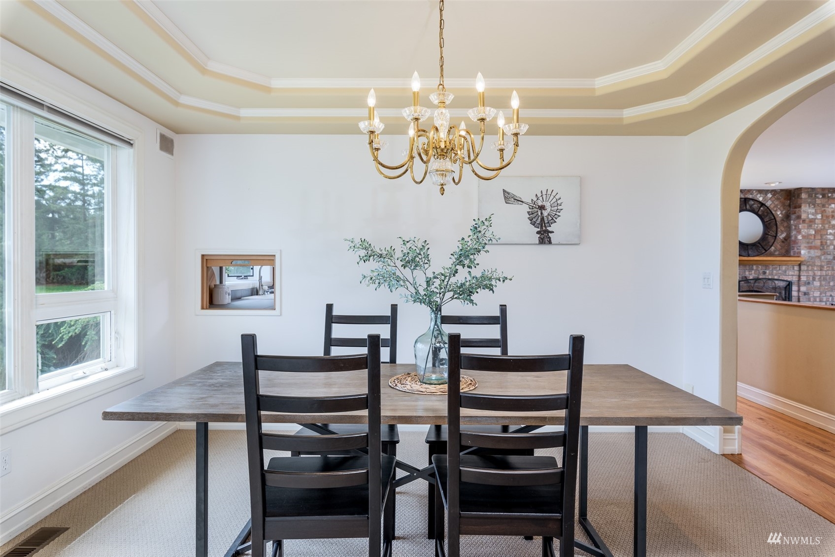 9647 Axlund Road Lynden, WA 98264 - Photo 7 of 39 a view of a dining room with furniture a chandelier and wooden floor