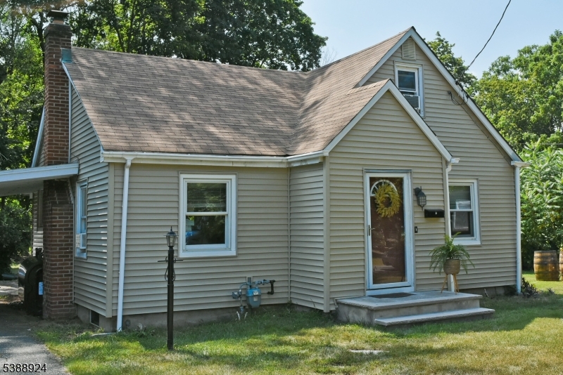 7 West Maple Avenue Succasunna, NJ 07876 - Photo 1 of 14 a view of a house with a yard
