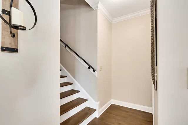 a view of entryway with wooden floor