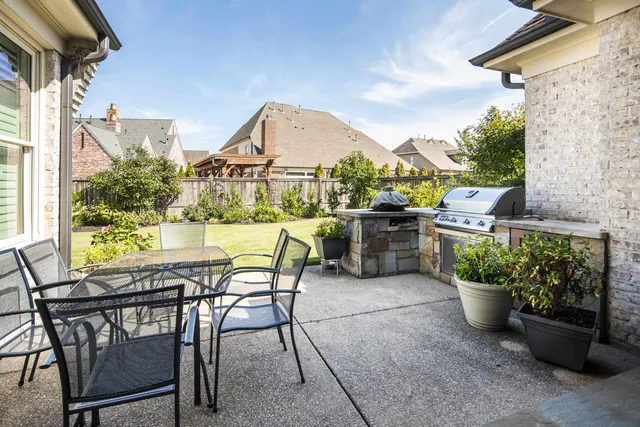 a view of a terrace with furniture and a potted plants