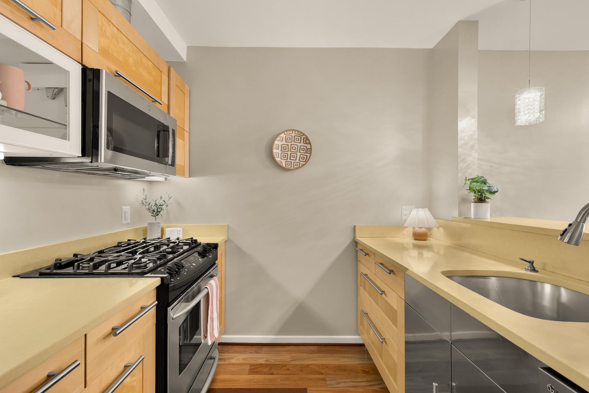 2434 Ontario Road Northwest, Unit 1 Washington, DC 20009 - Photo 7 of 20 Gas Range, Plentiful Prep Space, and Ample Storage