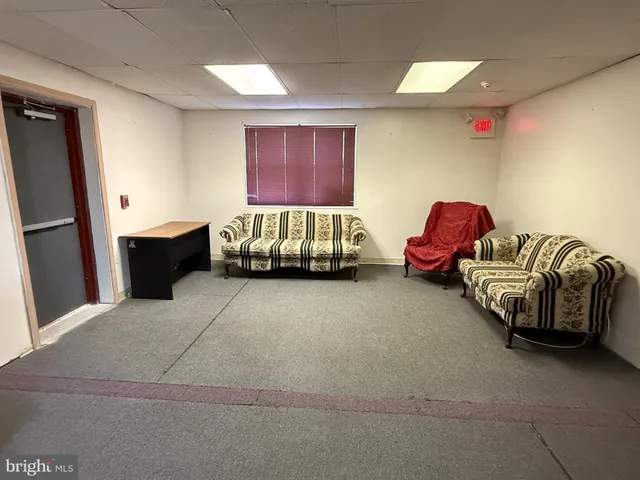 a view of a livingroom with furniture
