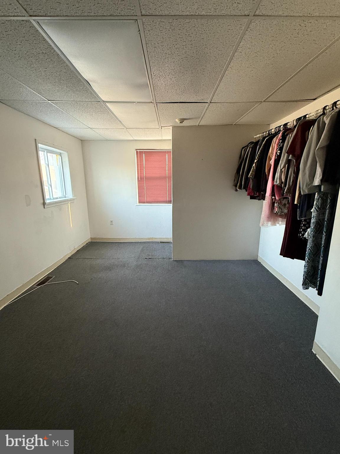 511 East Grape Street Vineland, NJ 08360 - Photo 17 of 40 a view of walk in closet with clothes