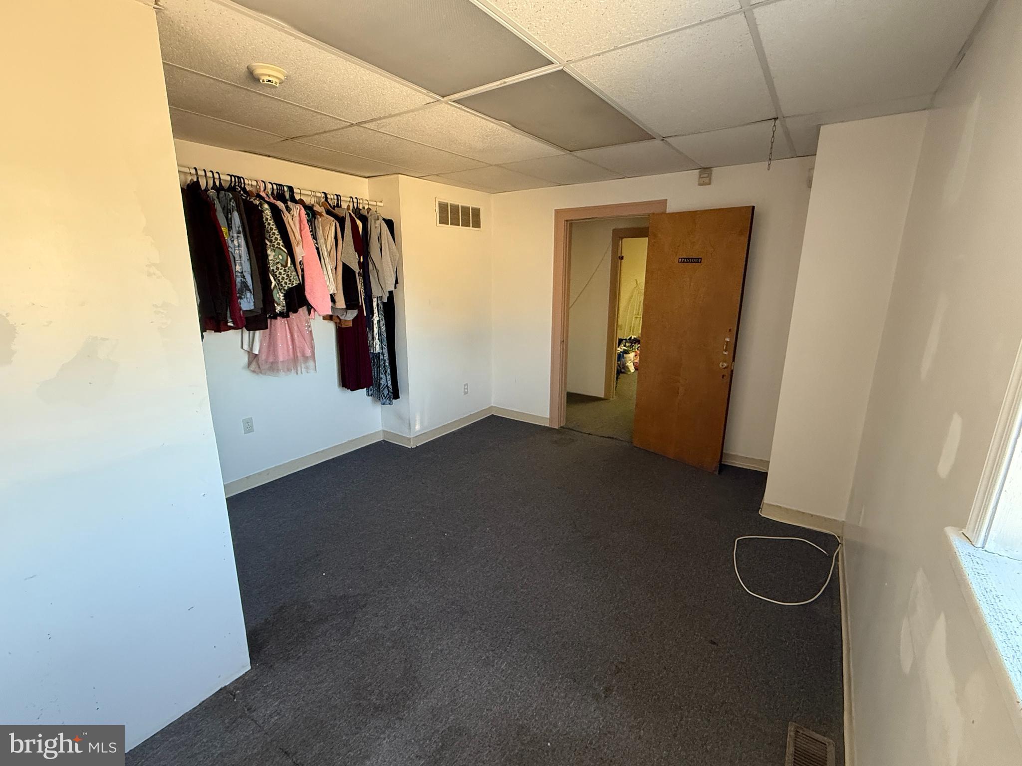 511 East Grape Street Vineland, NJ 08360 - Photo 19 of 40 a view of walk in closet with clothes