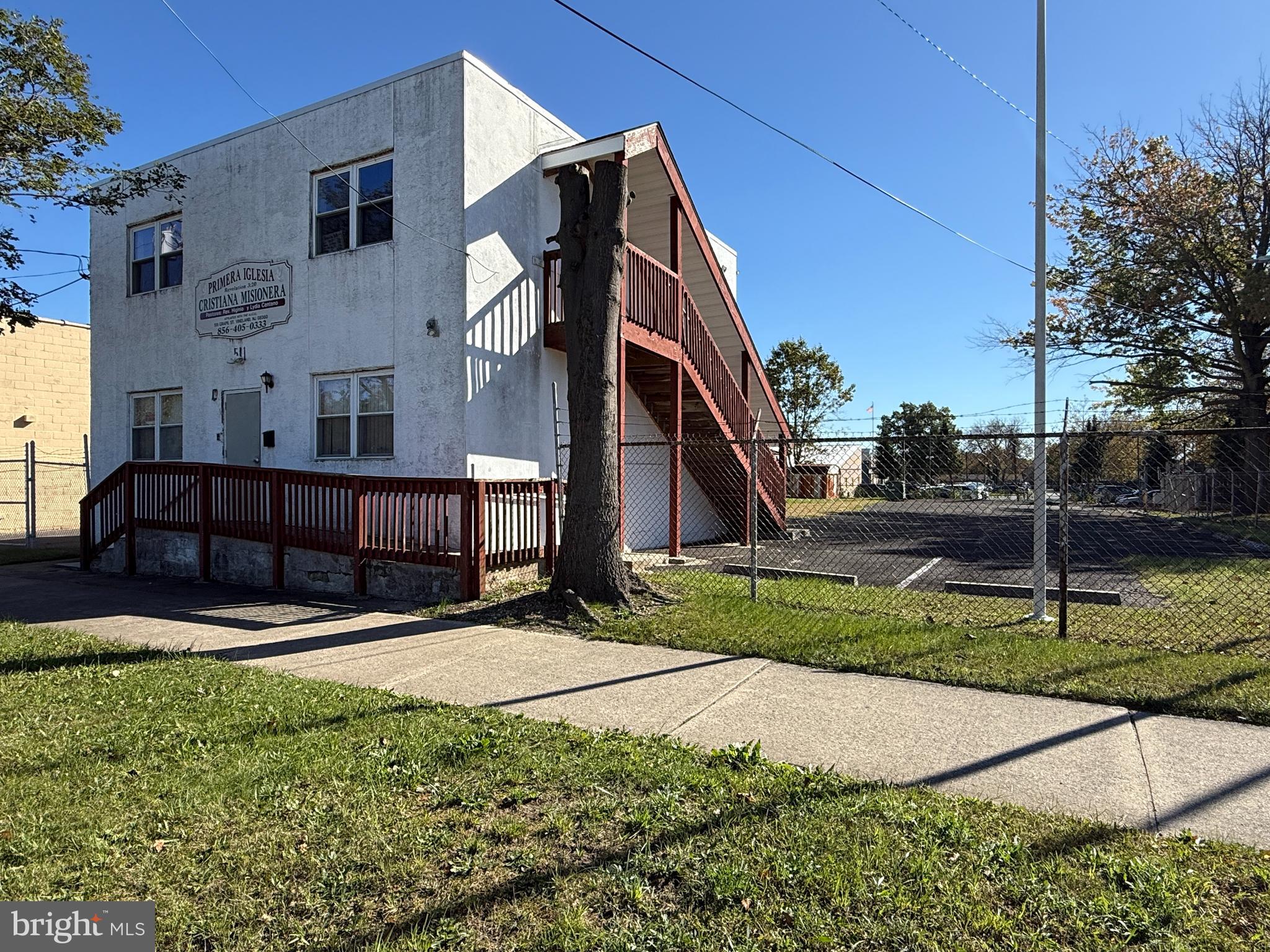 511 East Grape Street Vineland, NJ 08360 - Photo 4 of 40 a view of a house with backyard and trees