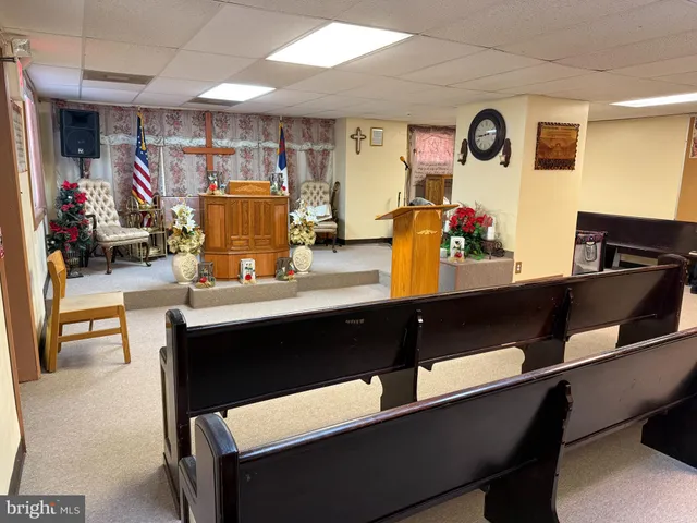 a room with table and chairs