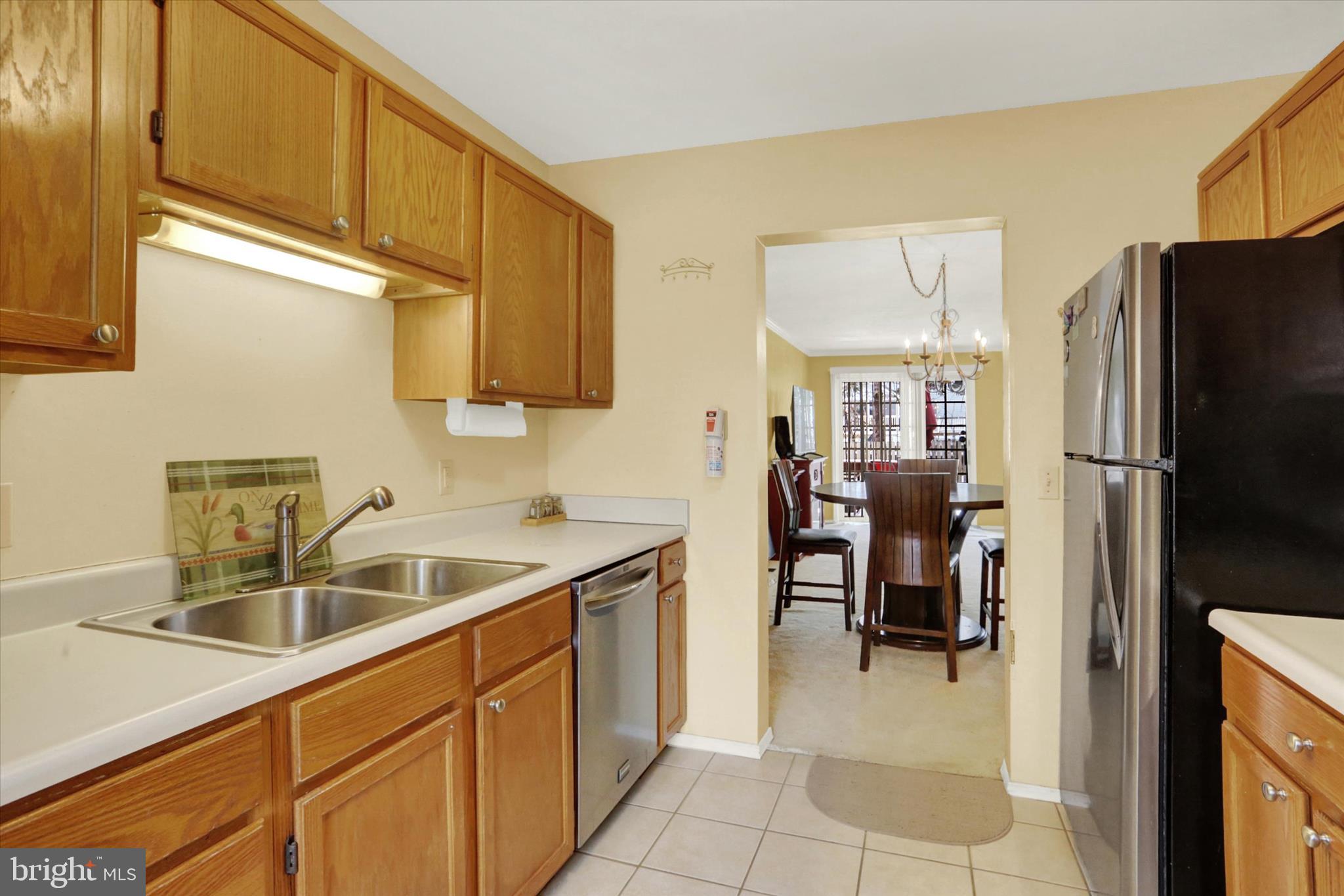 1947 Deer Path Road Harrisburg, PA 17110 - Photo 12 of 32 a kitchen with a sink cabinets and refrigerator