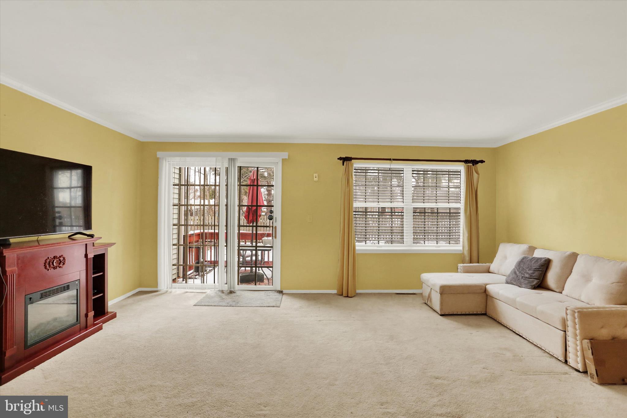1947 Deer Path Road Harrisburg, PA 17110 - Photo 9 of 32 a living room with furniture and a flat screen tv