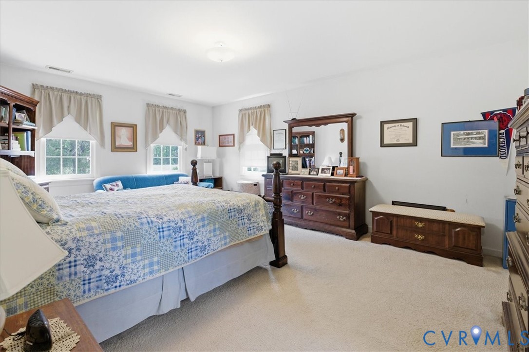 15414 Sunnybrook Road Petersburg, VA 23805 - Photo 27 of 29 a bedroom with a bed and a dresser