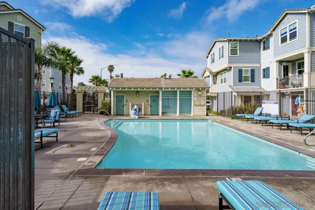a view of pool with outdoor seating