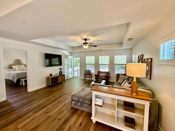 a living room with furniture and a window