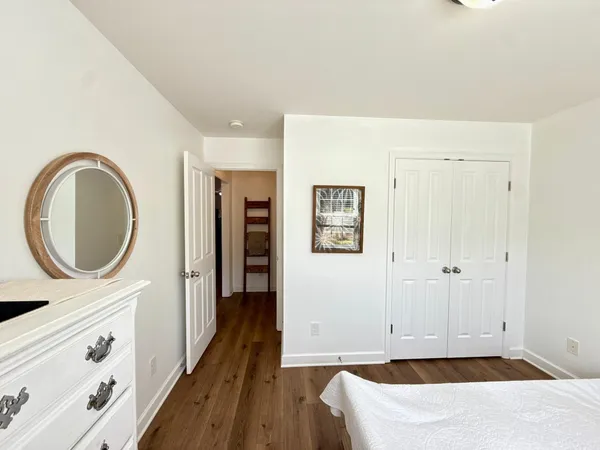 a view of a room with air conditioner and a window