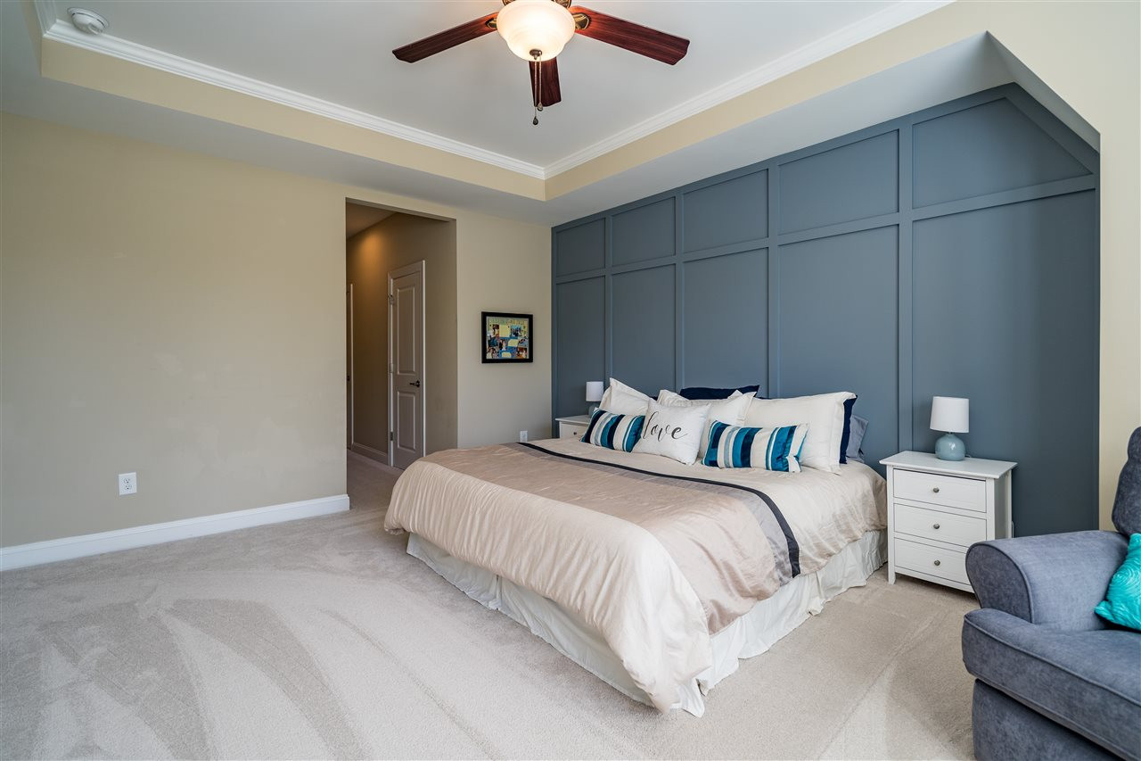 1411 Van Page Boulevard Raleigh, NC 27607 - Photo 18 of 26 Owner's suite leads to a hallway with two separate closets and huge bathroom oasis! Owner's Suite