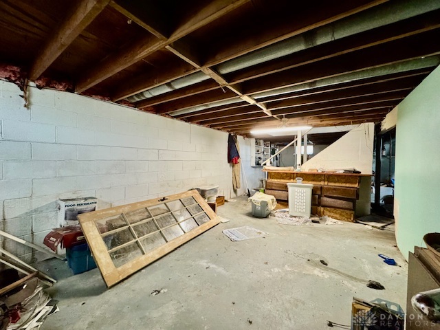 4733 Curtis Drive Springfield, OH 45503 - Photo 44 of 50 This spacious basement offers untapped potential for future customization and expansion.