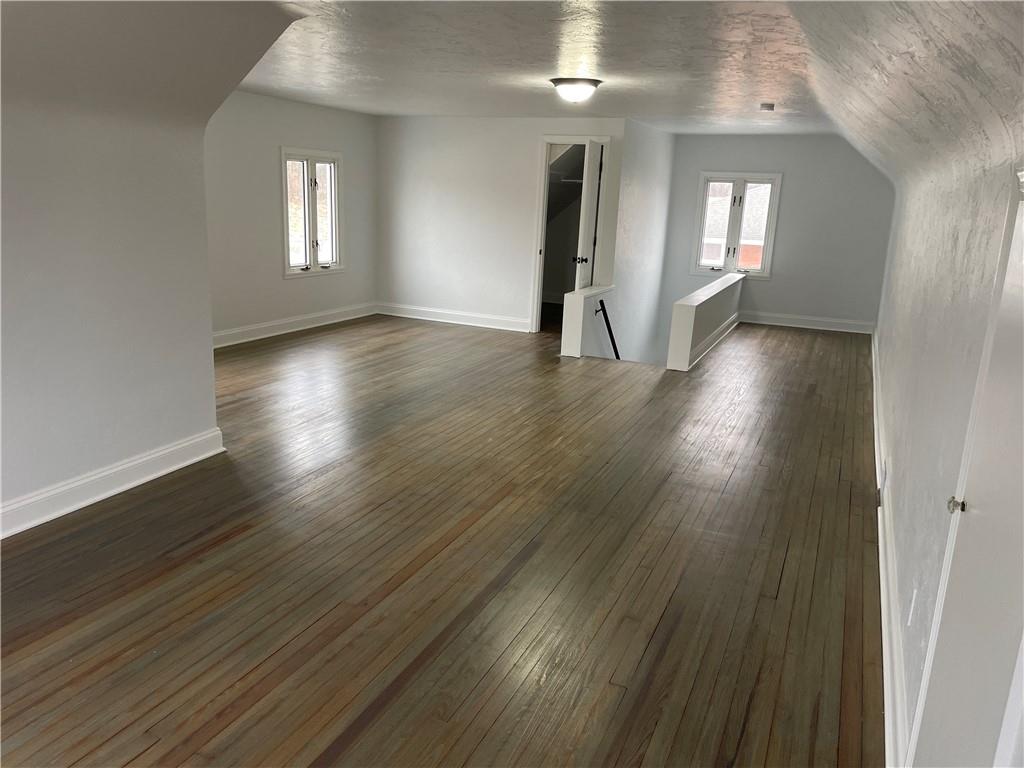 816 High Street Hiller, PA 15444 - Photo 11 of 21 a view of an empty room with wooden floor and a window