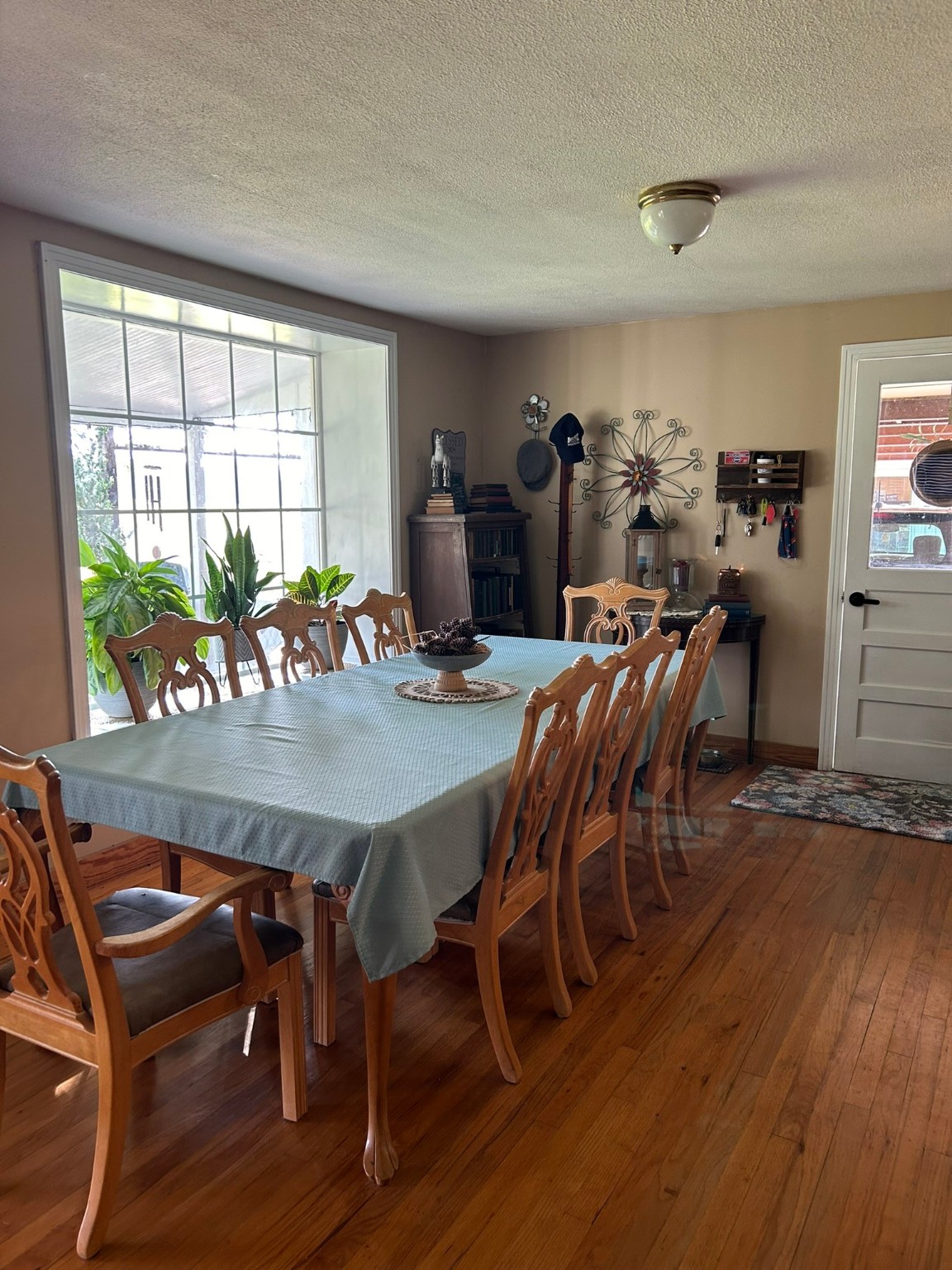359 Salmon Lake Road Grapeland, TX 75844 - Photo 10 of 49 a dining room with furniture and wooden floor to ceiling window