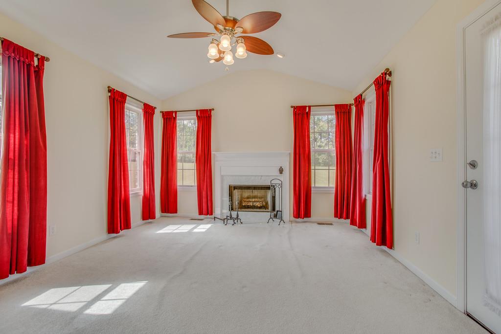 3424 Clegg Drive Spring Hill, TN 37174 - Photo 16 of 28 a view of a living room with furniture and a fireplace