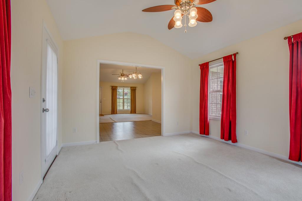 3424 Clegg Drive Spring Hill, TN 37174 - Photo 17 of 28 a view of a livingroom with a chandelier