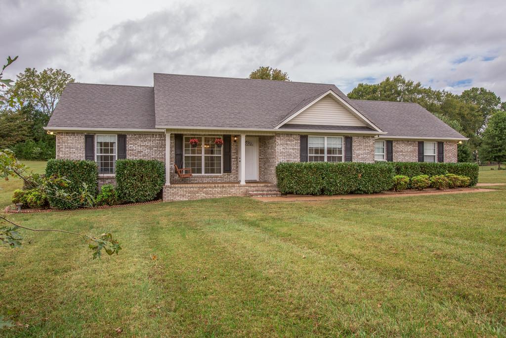 3424 Clegg Drive Spring Hill, TN 37174 - Photo 2 of 28 a front view of a house with a garden