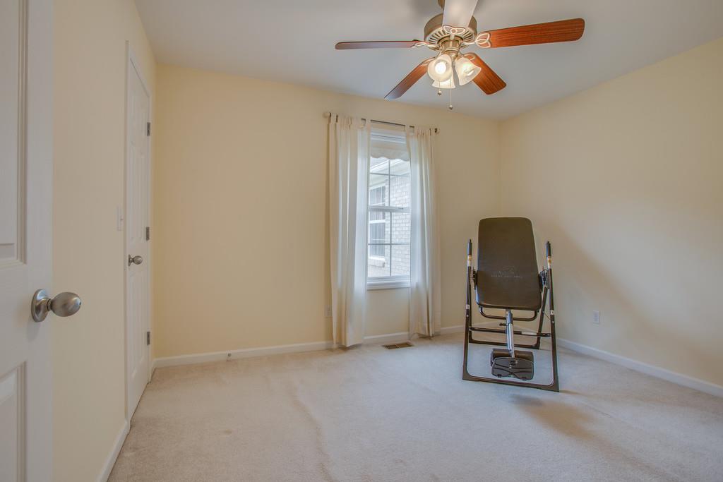 3424 Clegg Drive Spring Hill, TN 37174 - Photo 21 of 28 an empty room with windows and fan