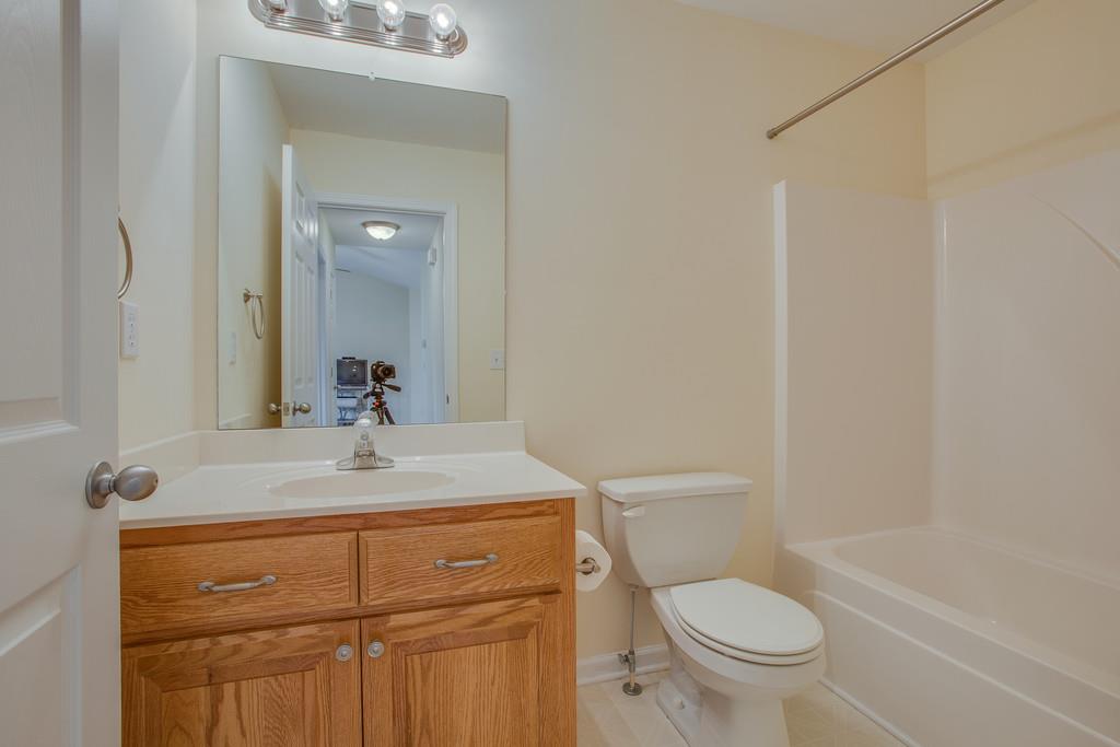 3424 Clegg Drive Spring Hill, TN 37174 - Photo 22 of 28 a bathroom with a sink a toilet and shower