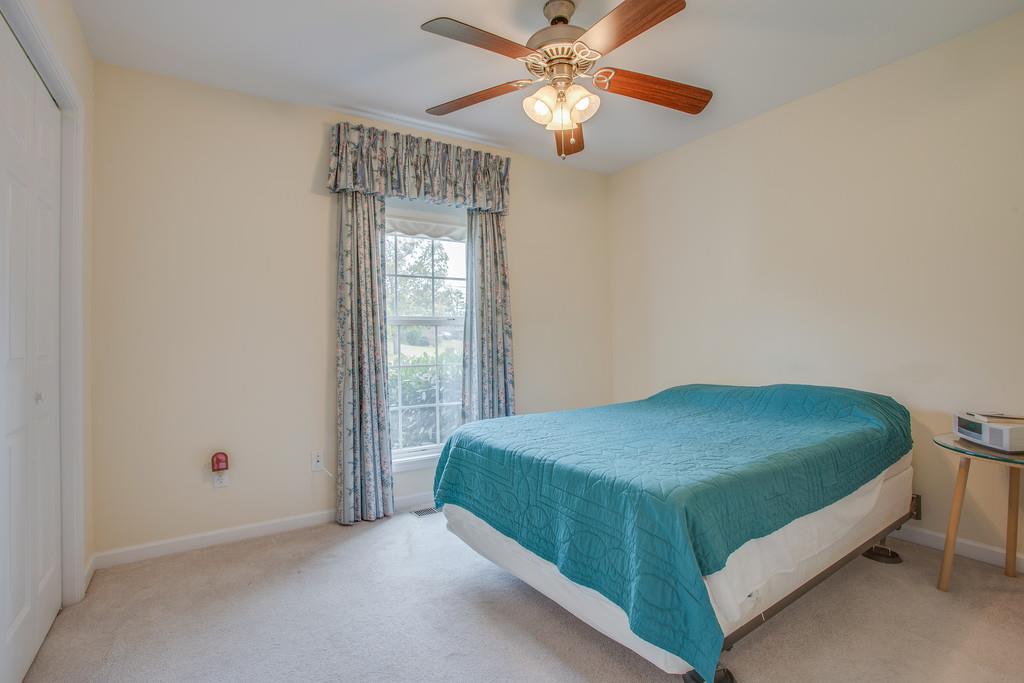 3424 Clegg Drive Spring Hill, TN 37174 - Photo 23 of 28 a bedroom with a bed and a window