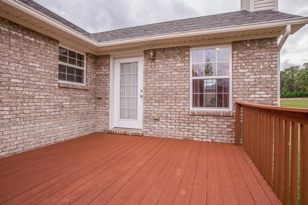 3424 Clegg Drive Spring Hill, TN 37174 - Photo 25 of 28 a view of an empty room with wooden floor and a window