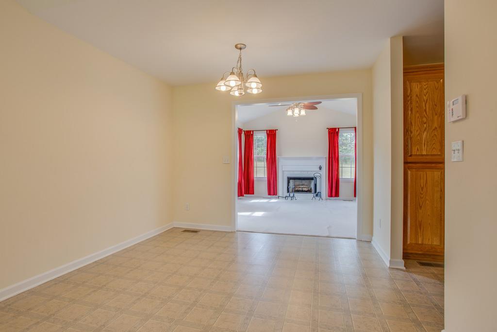 3424 Clegg Drive Spring Hill, TN 37174 - Photo 10 of 28 wooden floor in an empty room with a window