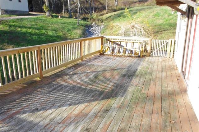 55 Hackett Hollow Road Pleasant Shade, TN 37145 - Photo 8 of 14 Side Deck