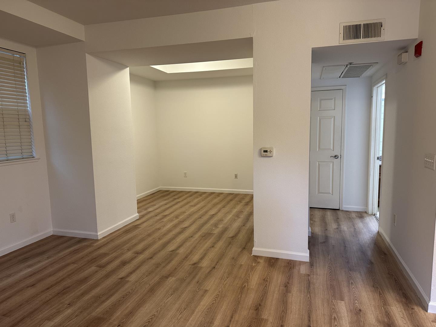 225 Pacifica Boulevard, Unit 101 Watsonville, CA 95076 - Photo 2 of 9 a view of bedroom with wooden floor