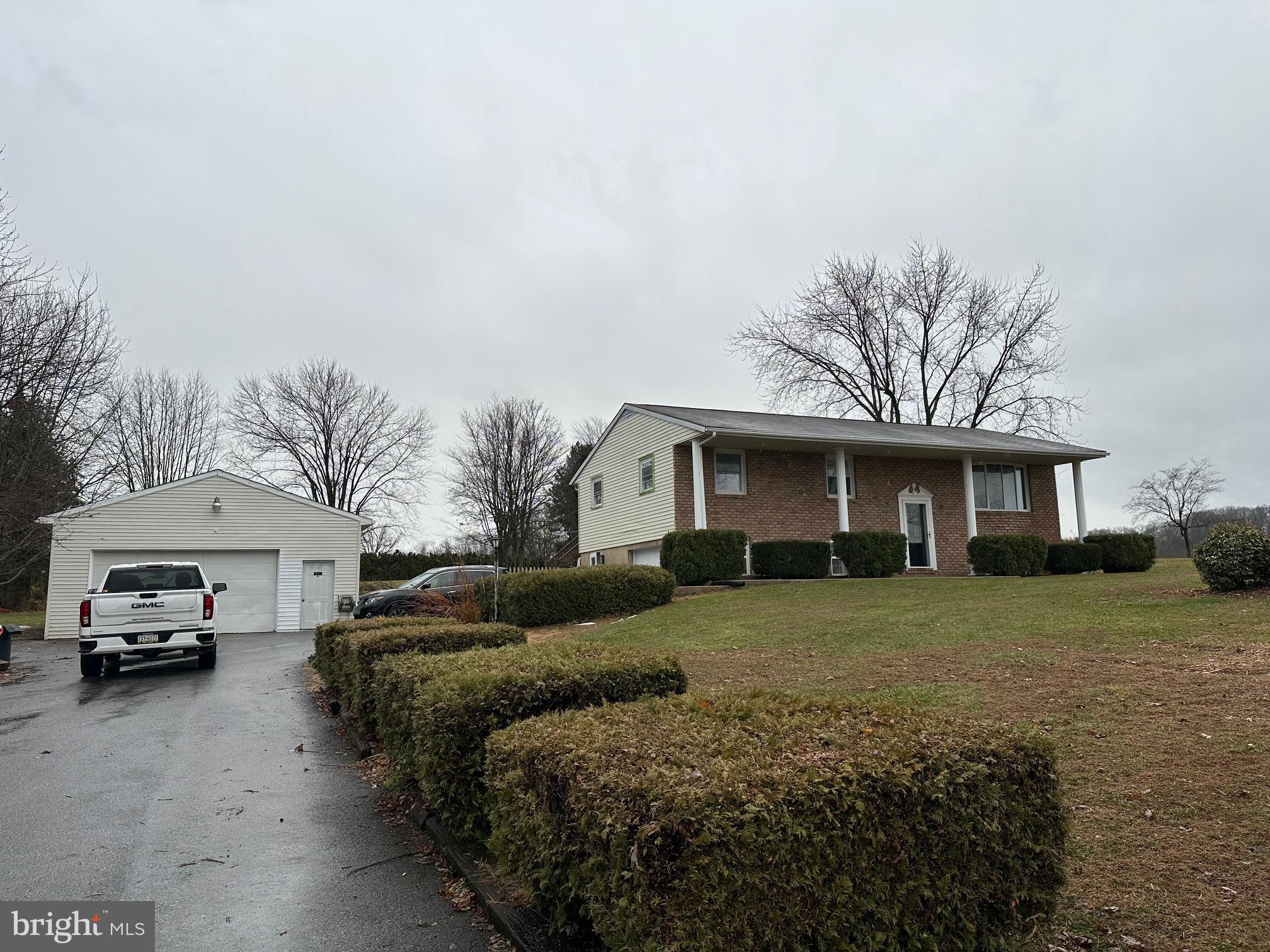a view of a car in front of house