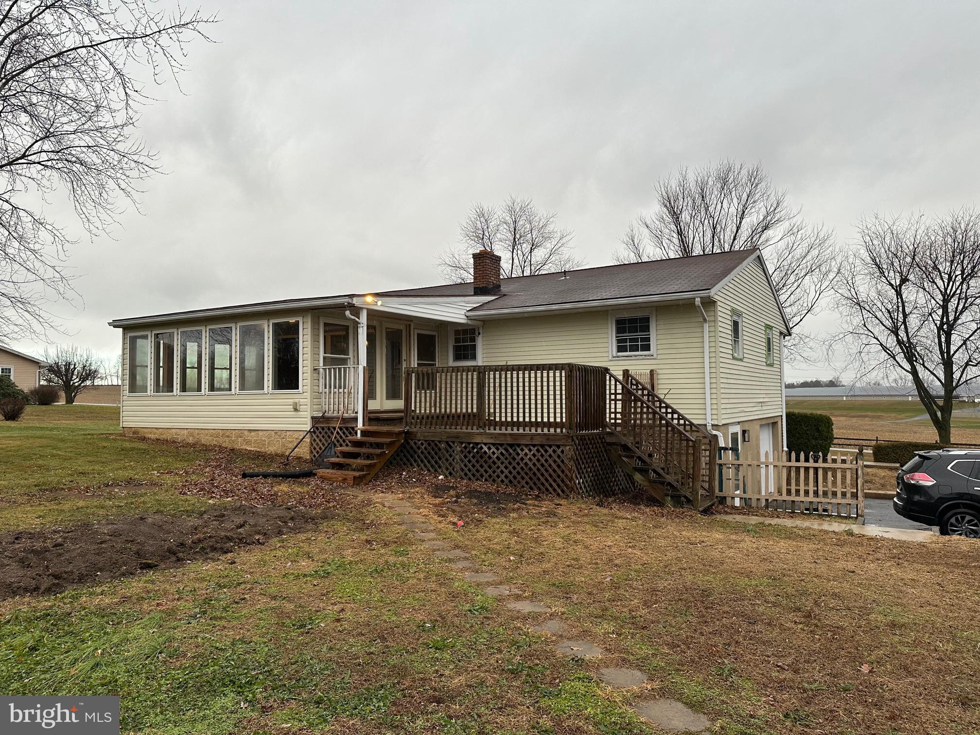 2562 Long Lebanon, PA 17046 - Photo 15 of 16 a view of a house with a large window and wooden fence