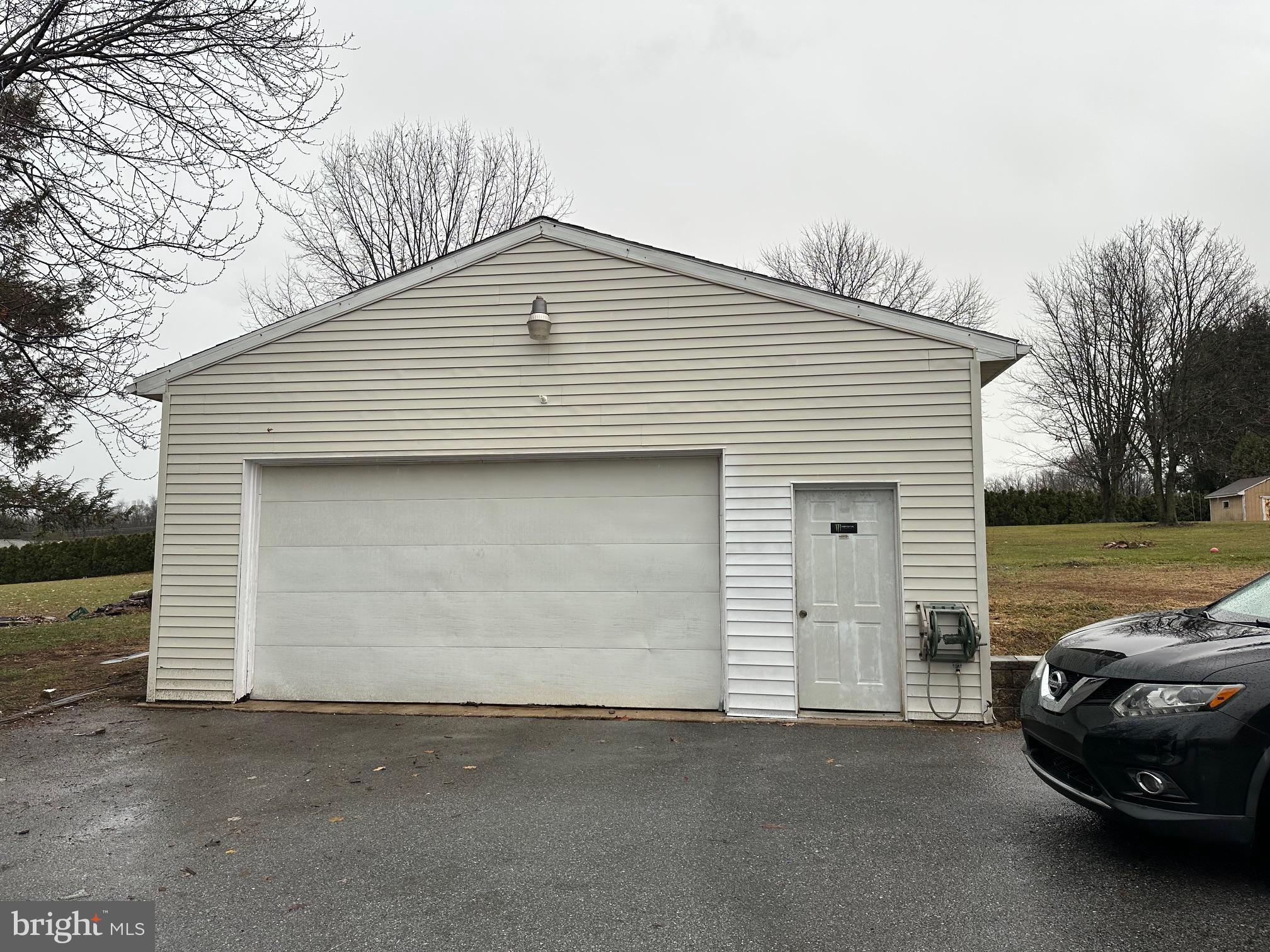 2562 Long Lebanon, PA 17046 - Photo 16 of 16 a car parked in front of white house