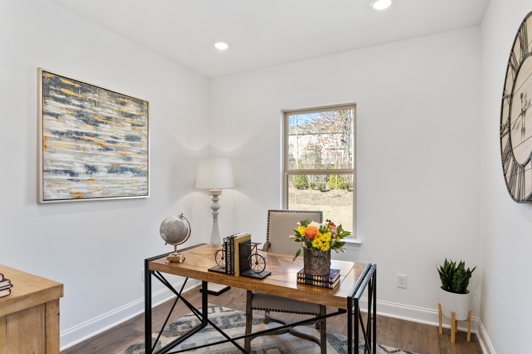 1104 Riverview Run Madison, TN 37115 - Photo 25 of 55 a view of a workspace room with furniture and a potted plant