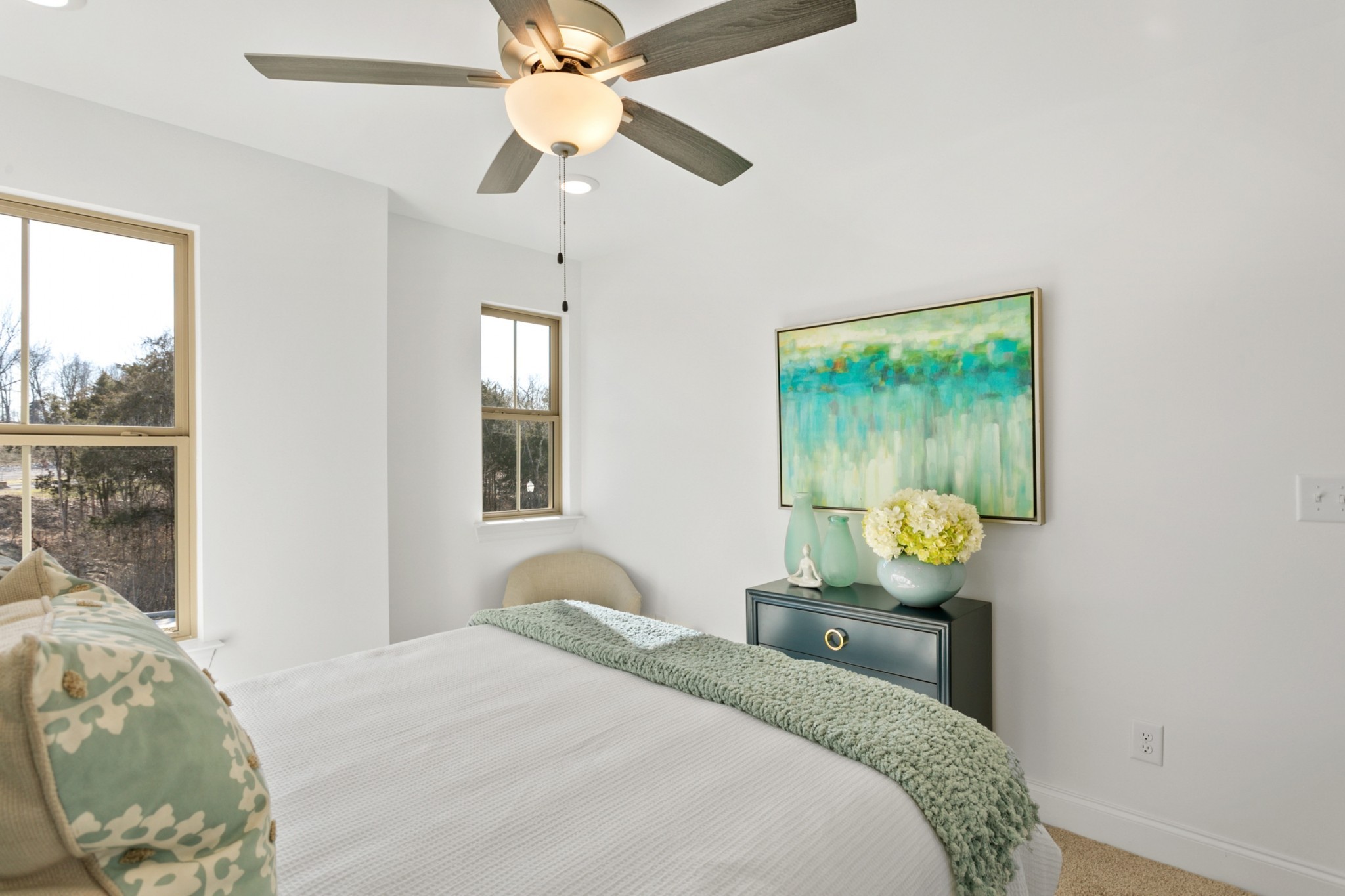 1104 Riverview Run Madison, TN 37115 - Photo 45 of 55 a bedroom with a bed and a chandelier