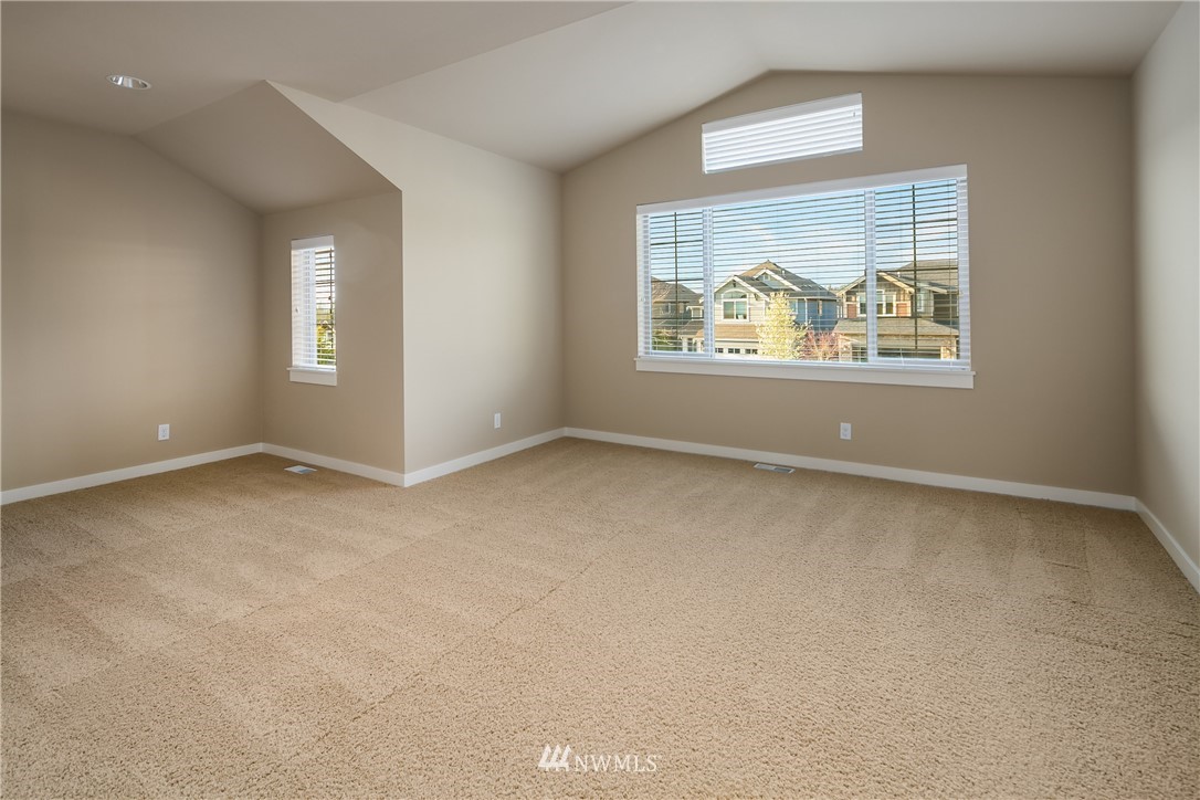 5639 Northeast 7th Place Renton, WA 98059 - Photo 17 of 23 an empty room with windows