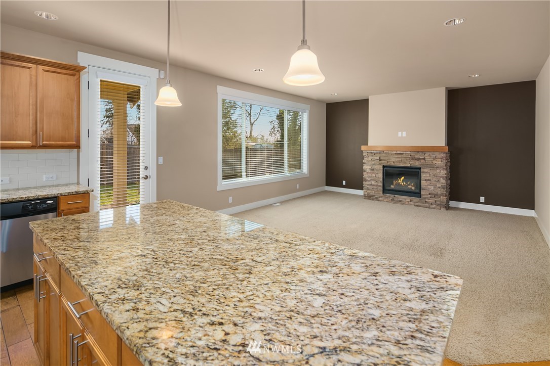 5639 Northeast 7th Place Renton, WA 98059 - Photo 9 of 23 a view of kitchen and granite countertop stove top oven