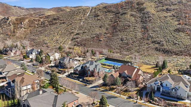 714 Draper Heights Way Draper, UT 84020 - Photo 88 of 88 Aerial view of residential area featuring a mountainous background