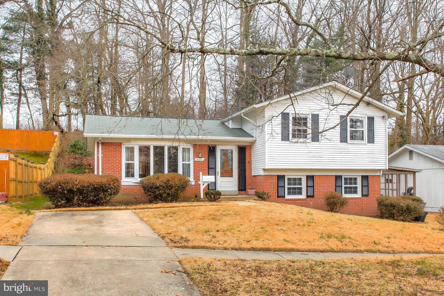 4106 Delancy Drive Silver Spring, MD 20906 - Photo 1 of 30 a front view of a house with a yard